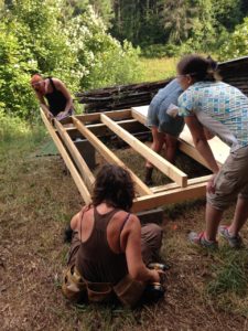 framing a floor in a women's carpentry course