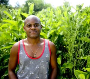 apprentice with permaculture plants