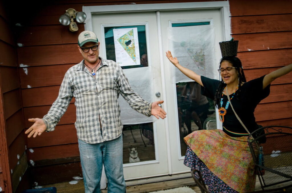 landowner and farmer together excited