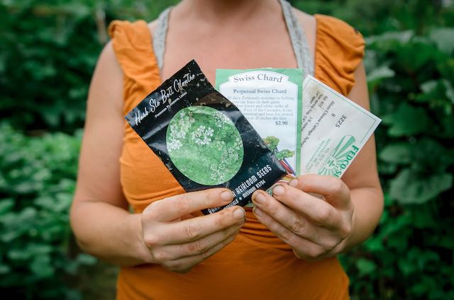Woman holding seed packets