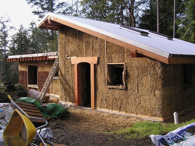 Timber frame with straw bale infill