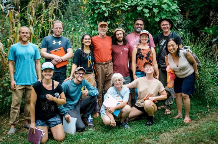 smiling students in a permaculture design course