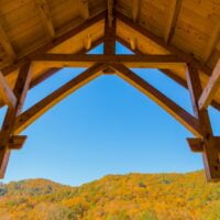A view of the mountains at Wild Abundance's carpentry campus as seen from inside a Timber Frame teaching pavilion constructed during a workshop