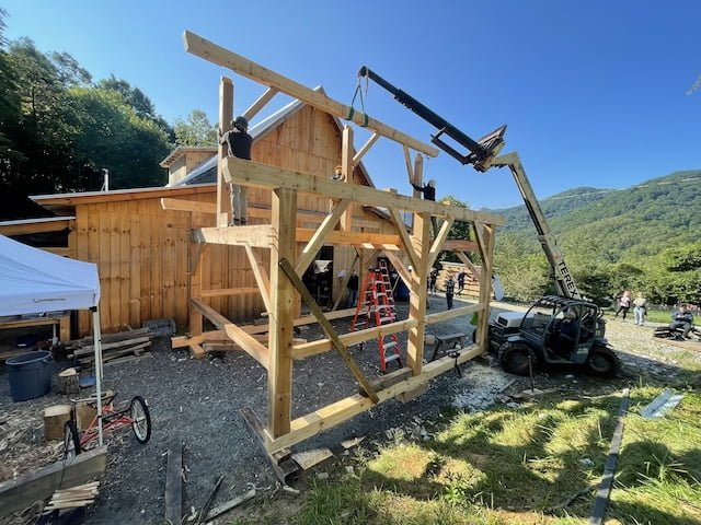 Demonstrating safety while raising a timber framed barn