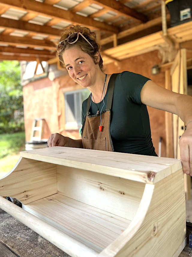 Student works on toolbox project during women's basic carpentry class