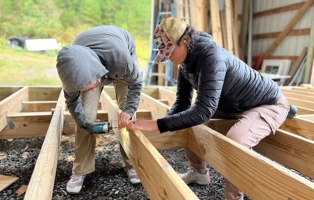 Two students build foundation during tiny house class