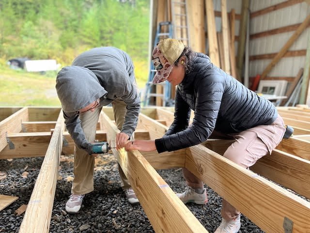 Two students build foundation during tiny house class