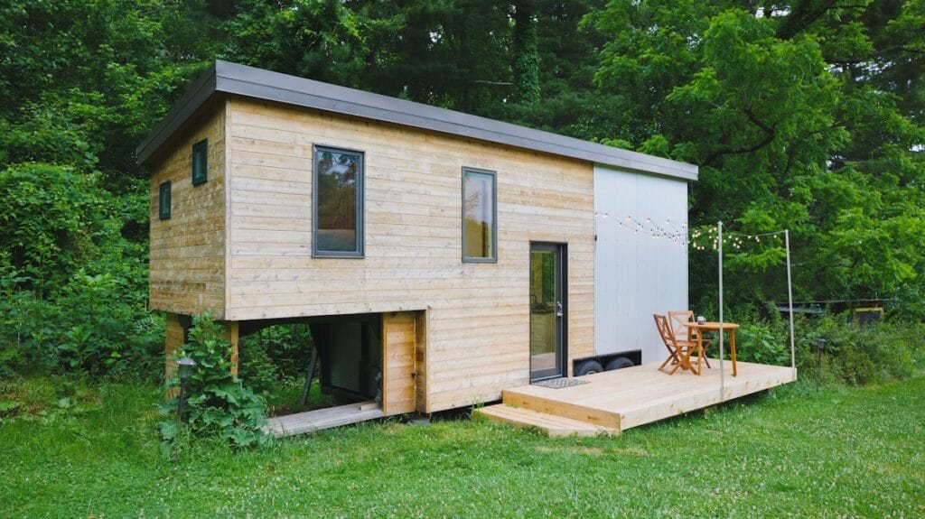 Exterior wide shot of an owner-builder's Tiny House built by a student of the Wild Abundance Online Tiny House Academy