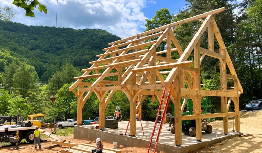 The Timber Framed Teaching Pavilion mid-construction during a building workshop at Paint Fork Campus