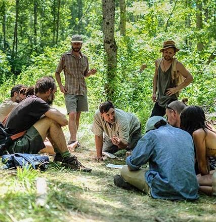 Man teaches group during survival skills class