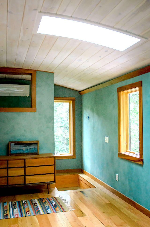 Earthen paint in a natural built tiny house tour