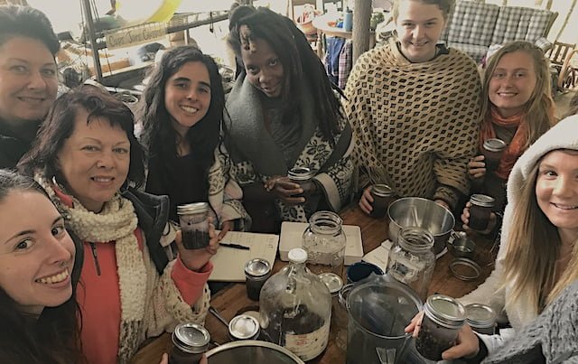 tincture making with women of different ages and colors during women's rewilding class