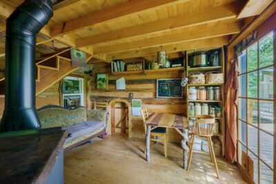 tiny house kitchen and living room with reading nook