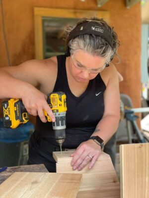 woman using a drill 