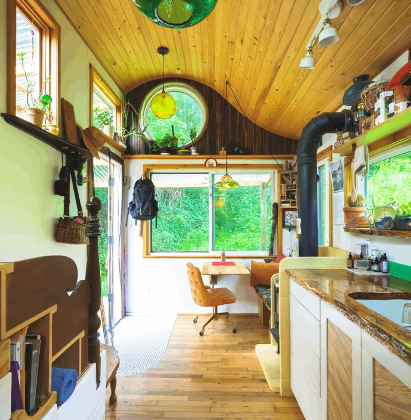 beautiful and whimsical tiny house kitchen and lounge
