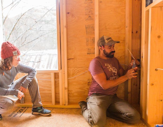 Instructor teaches electrical to building apprenticeship student