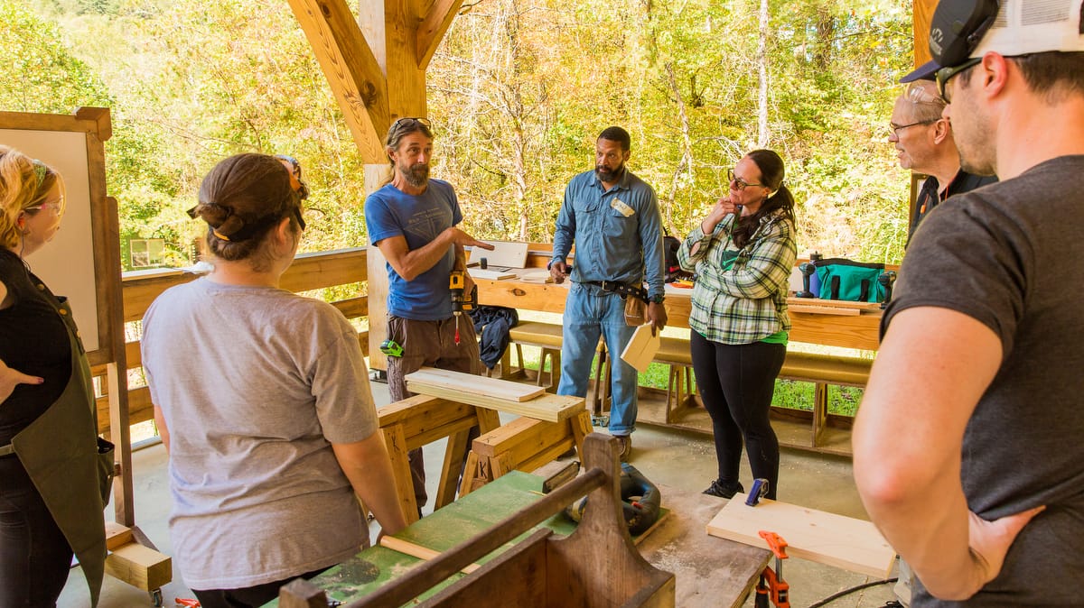 ABC-1200-2025-98 students learn hands-on DIY skills with powertools and woodworking at an inclusive adult beginner carpentry workshop at Wild Abundance in North Carolina