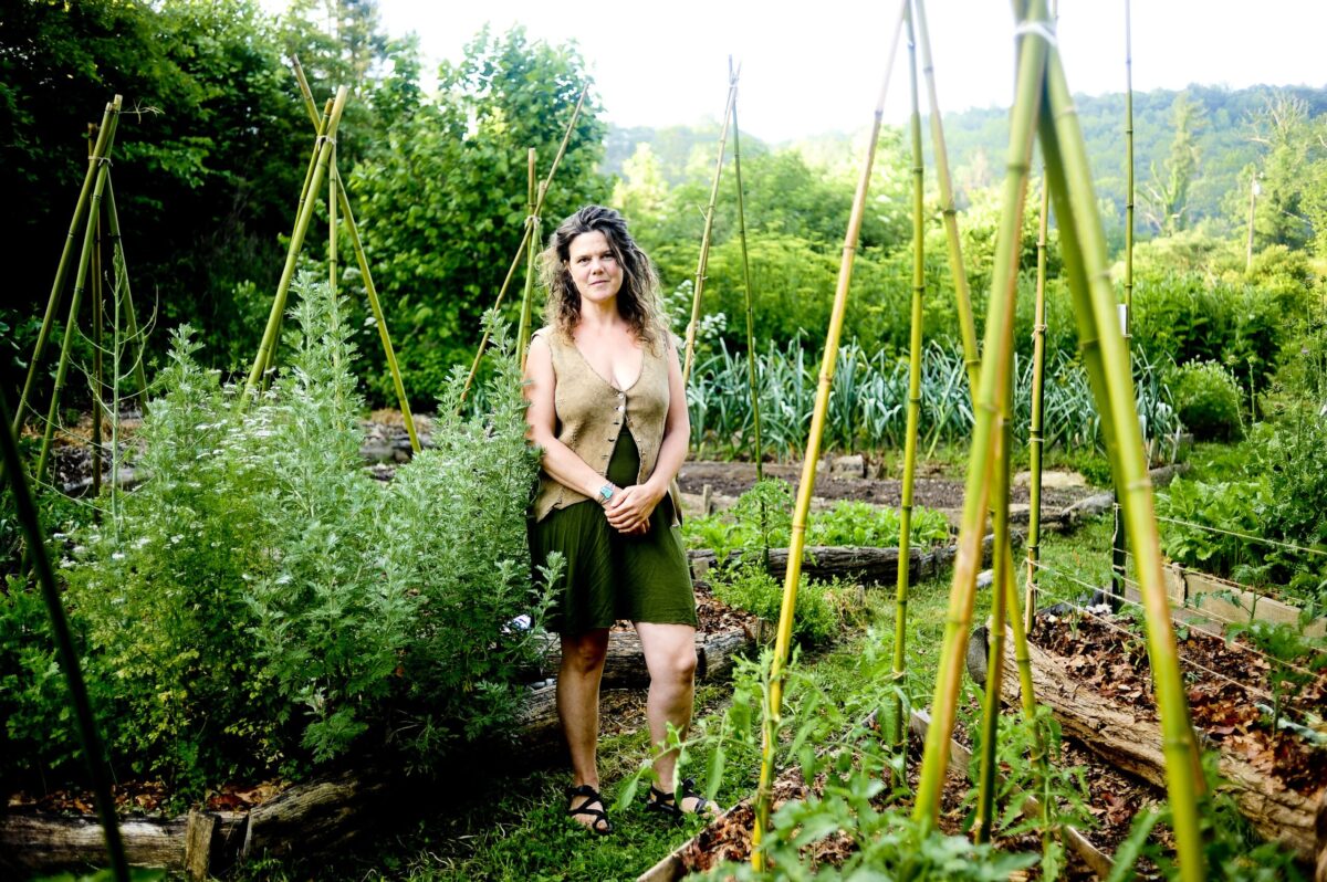 Natalie in garden Natalie Bogwalker in the garden at the original home of Wild Abundance, a DIY skills school she founded in North Carolina