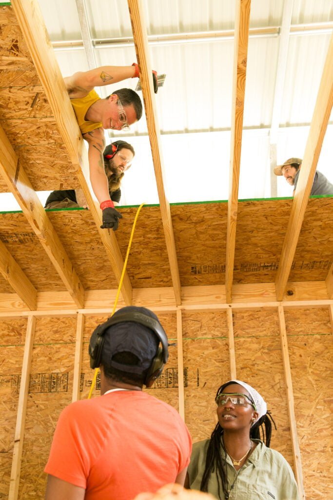 Students in a carpentry class learn to build a Tiny House 
