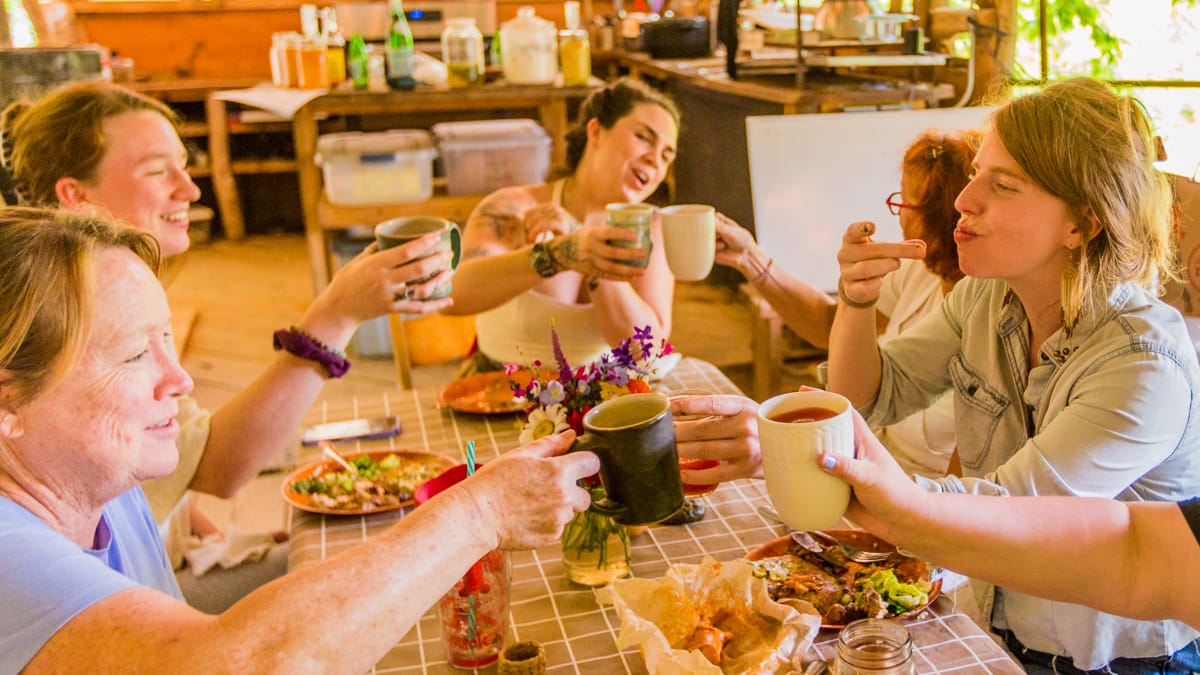 Women in the Nourishing Foods Class enjoy a feast on the last day of the retreat for women