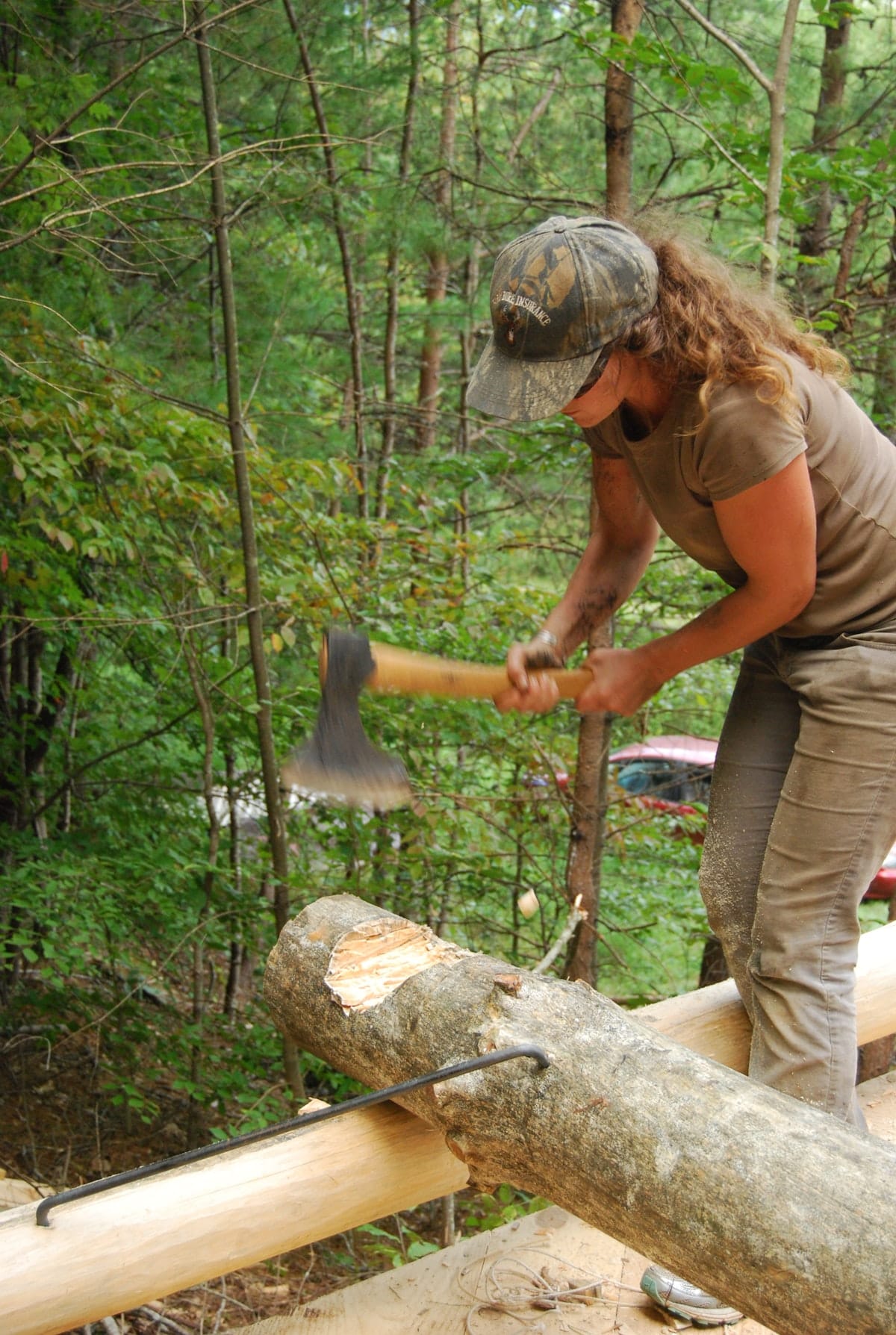 nat hathetting log-natalie building her cabin Natalie working on the small log cabin she built herself at Wild Abundance