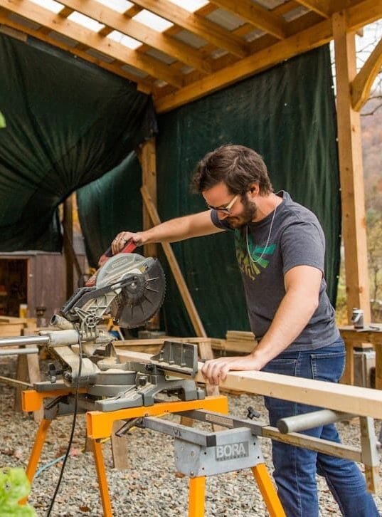 Hayden-male-mitre-saw-all-genders-carpentry01-e1735839478395