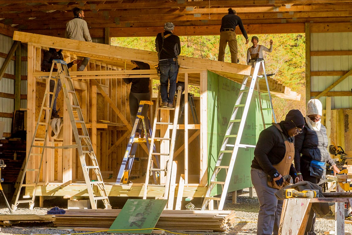 students learn DIY building skills in a Tiny House building workshop at Wild Abundance