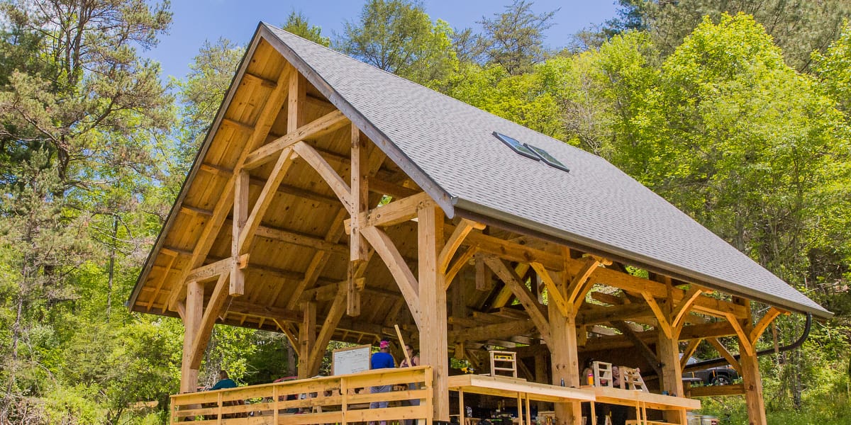 above the workshop in the teaching pavilion there is a balcony level shared dorm with bunk beds for students who wish to rent a bed during their visit for a carpentry or permaculture workshop or class at Wild Abundance's main campus at Paint Fork Road in Barnardsville, NC