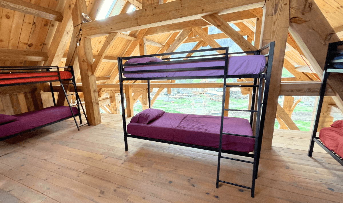 dorm bunk beds in the top of the open air teaching pavilion at Wild Abundance campus in North Carolina