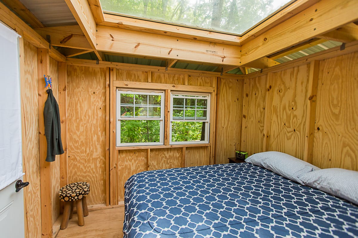 Inside each private 10x10 sleeping structure is a comfortable bed with bedding under a skylight, a battery with lights and ports for charging devices. Students can rent these "skyview private cottages" during classes at Wild Abundance, but book them quickly because demand is greater than supply!